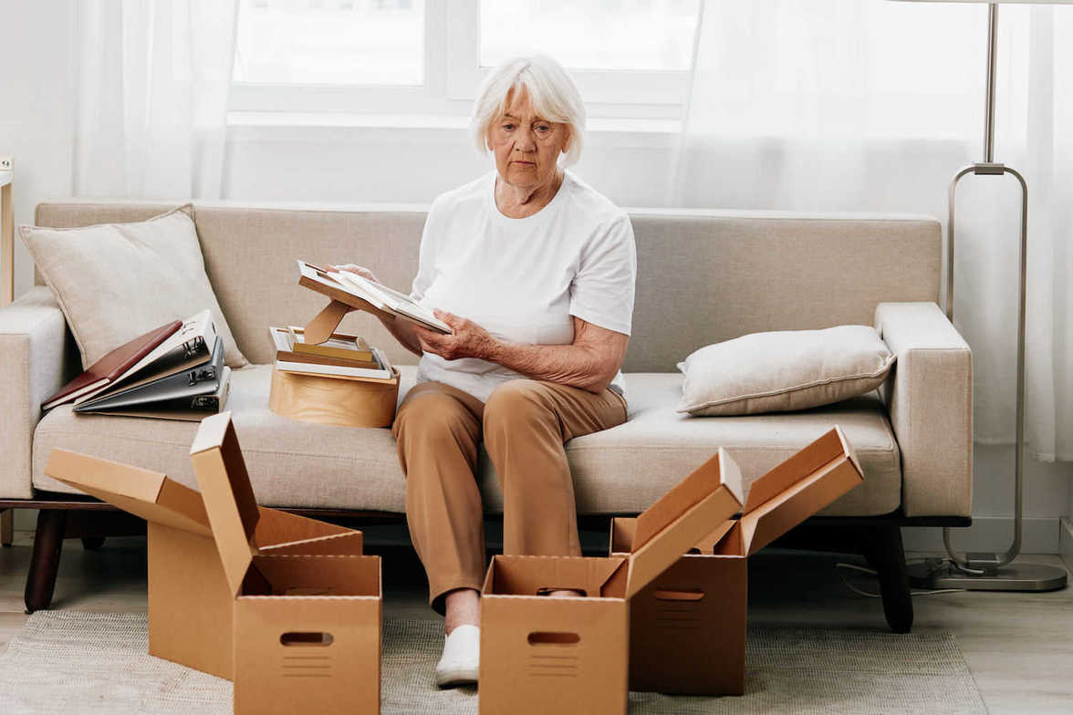 elderly lady parting with possessions