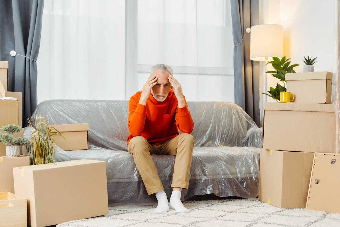 Tired Man Parting with Possessions